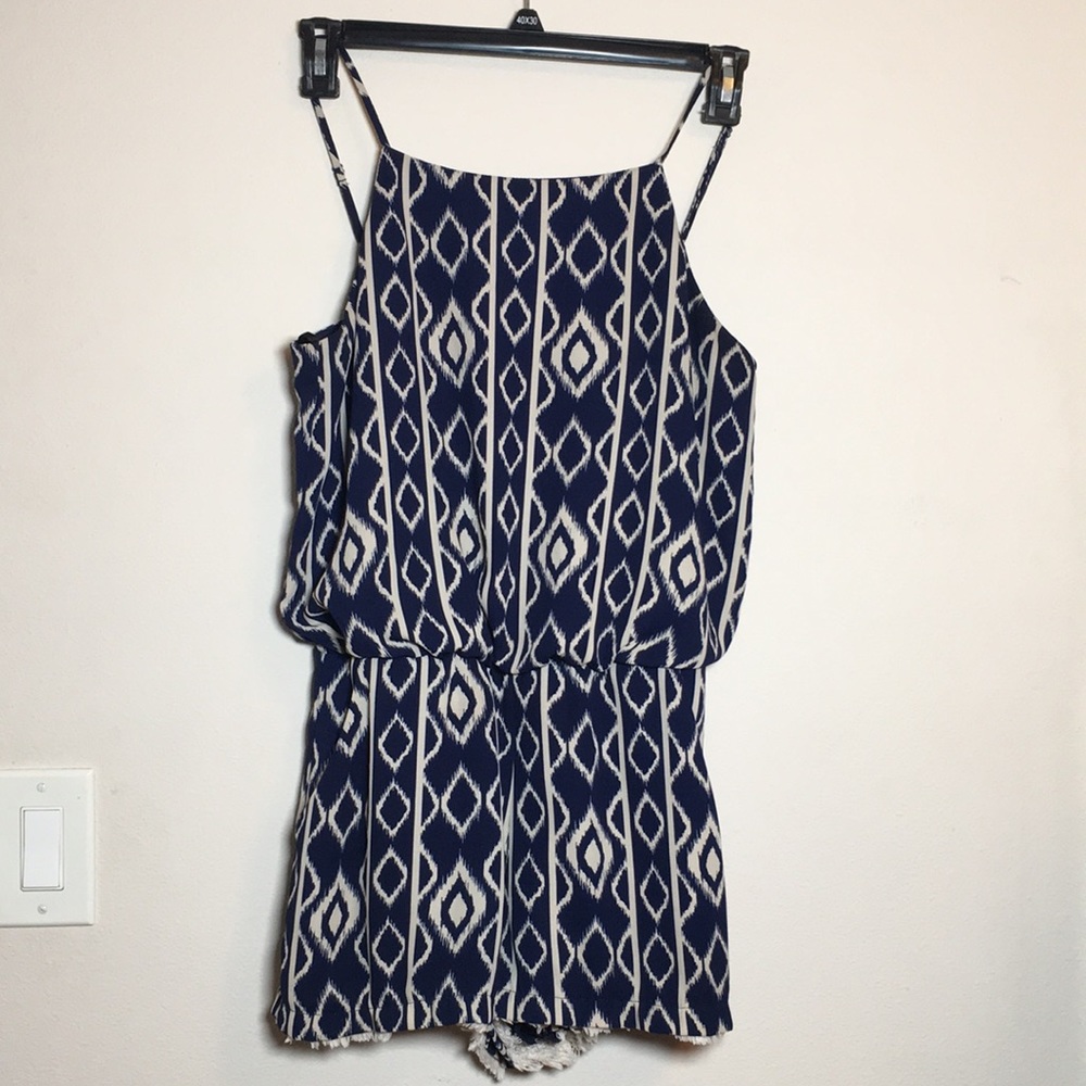 Romper for Summer, comfortable, stylish. Dark blue with cream shapes.